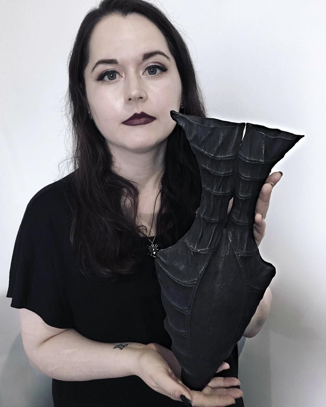 Rhiannon Crowley holding an object from The Salient Dead